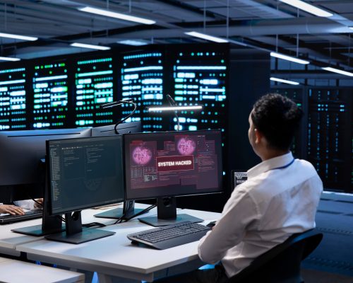 Data center cybersecurity division colleagues fighting malware